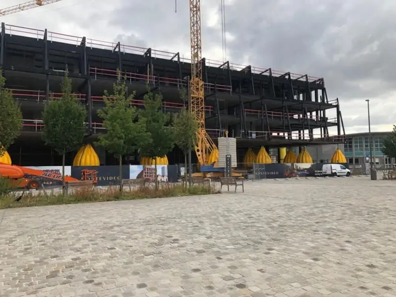 Street-level view of the confined city-centre construction site in Belgium where Unique Group deployed Water Weights load testing bags
