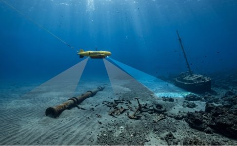 Side scan sonar towfish scanning seabed with shipwreck, pipeline and debris for offshore geophysical survey mapping