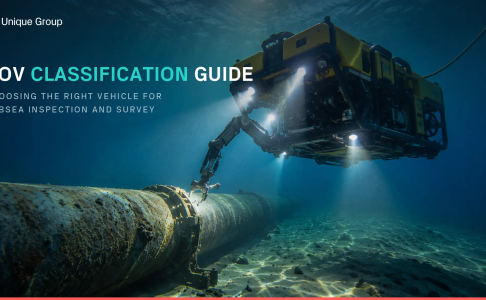 Work-class ROV using its manipulator arm to inspect a subsea pipeline, illustrating ROV classification from Unique Group